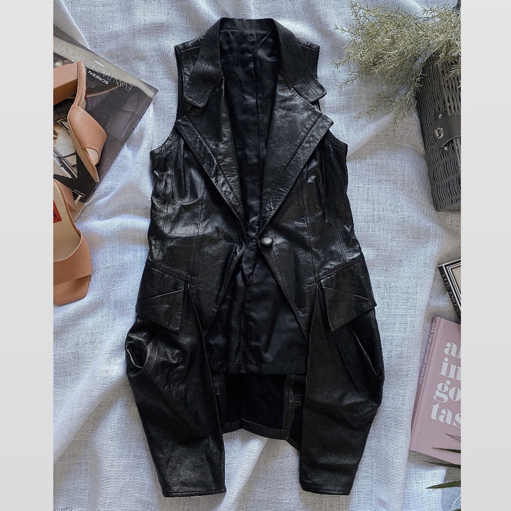 Vintage genuine lamb skin vest. Size S. In excellent condition, no tags.